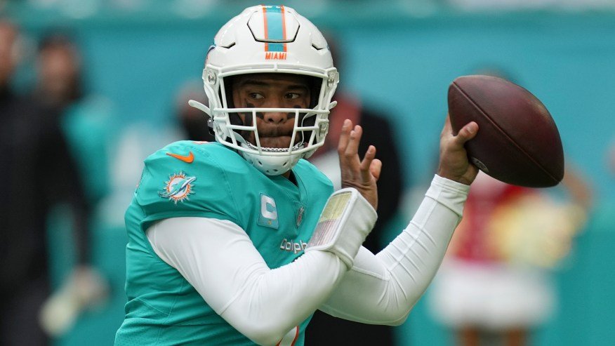 Miami Dolphins quarterback Tua Tagovailoa (1) looks to pass during the first half of an NFL football game against the Green Bay Packers, Sunday, Dec. 25, 2022, in Miami Gardens, Fla.