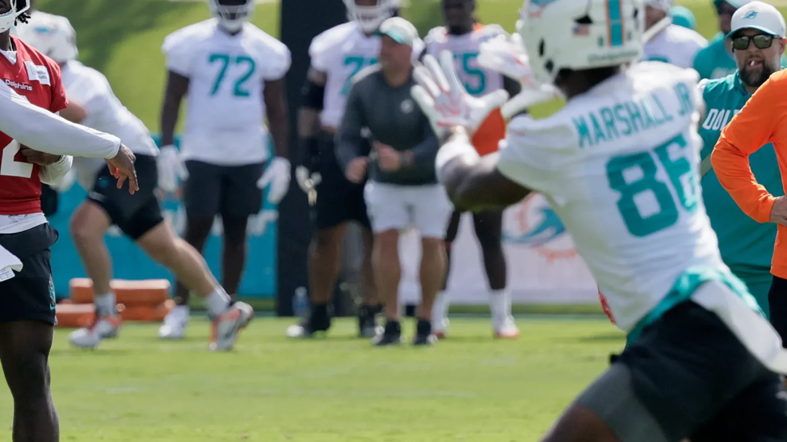 Malik Willis throws a pass to WR Terrace Marshall Jr.