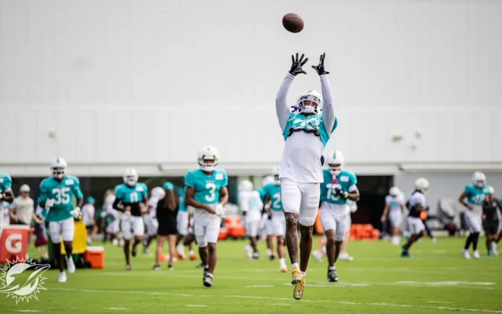 Miami Dolphins CB Jason Marshall Jr in practice with the rest of the roster in the background