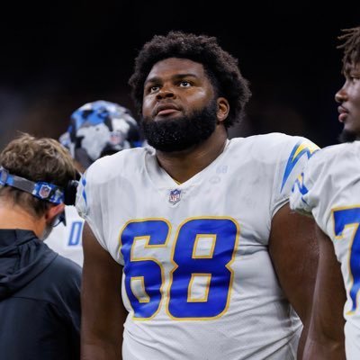 Jamaree Salyer in a Chargers uniform looking up