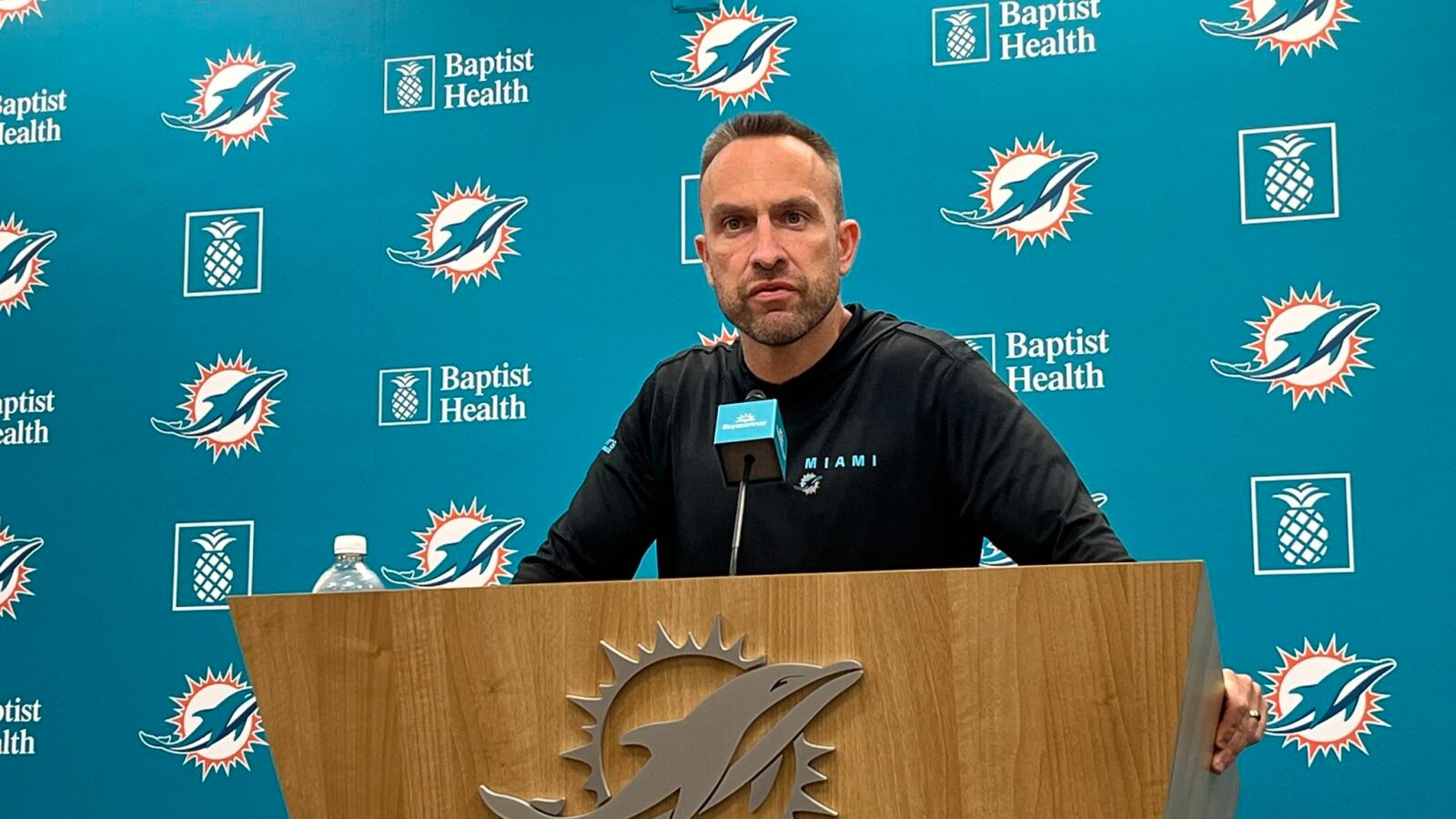 Miami Dolphins head coach Jeff Hafley at the podium for a press conference
