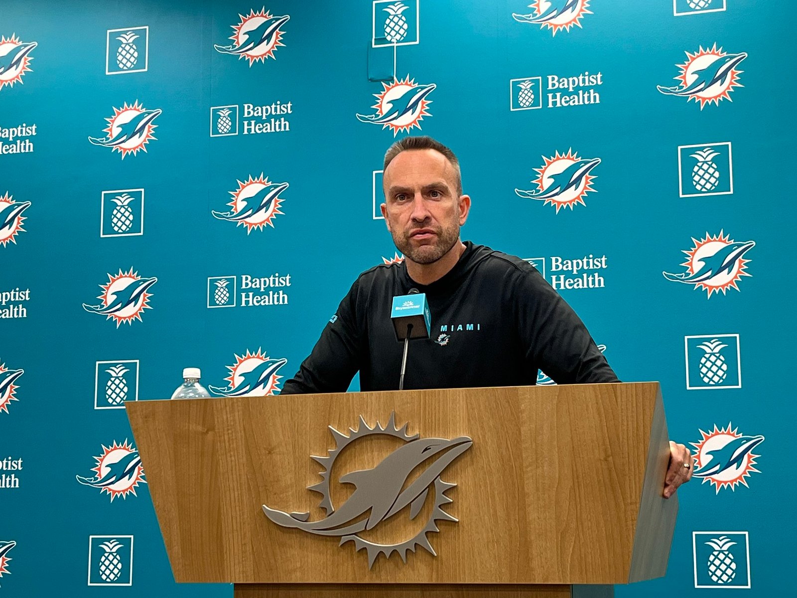 Miami Dolphins head coach Jeff Hafley at the podium for a press conference