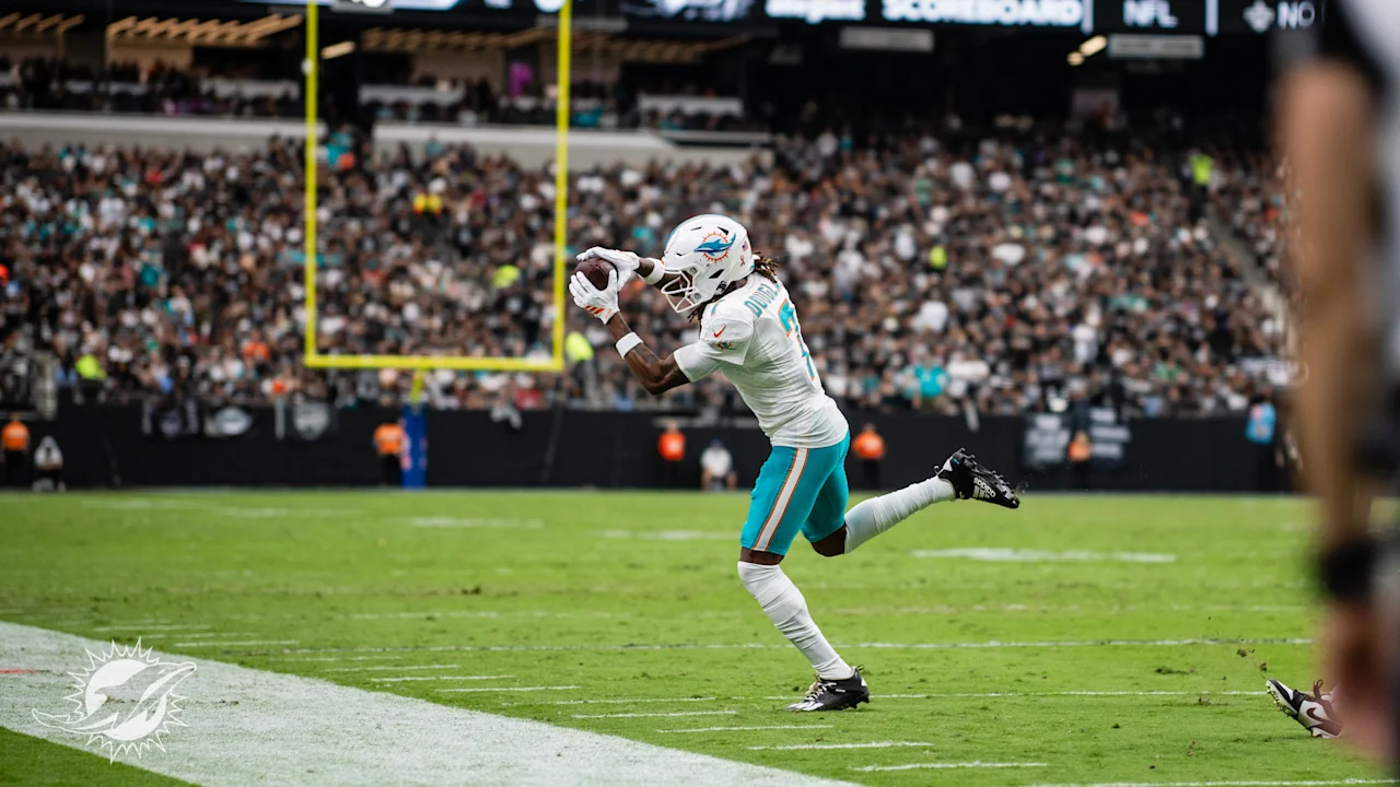 Miami Dolphins WR Caleb Douglas makes a sideline catch against the LV Raiders